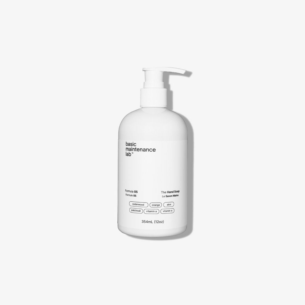 Basic Maintenance Formula 05 The Hand Soap shown in a white Boston round bottle with a pump cap